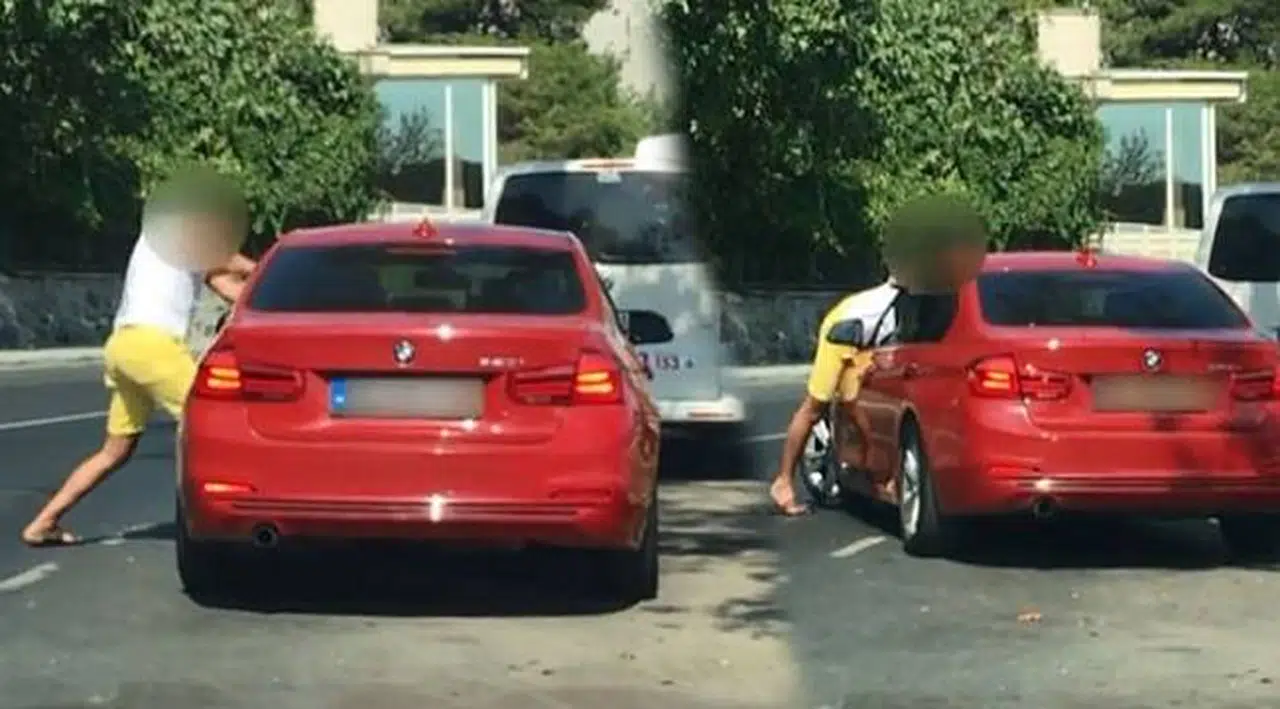 Tartıştığı eşi otomobilin kapılarını kilitleyince az daha canından oluyordu