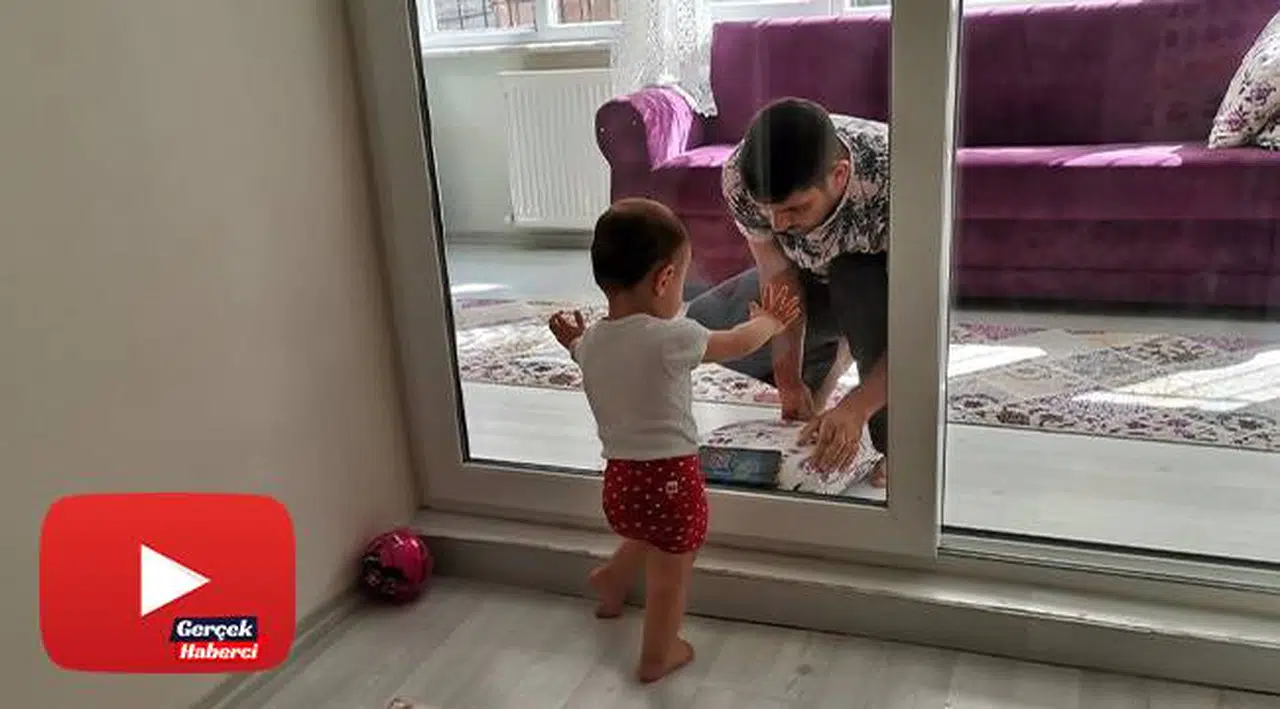 Korona virüslü baba, 2 yaşındaki kızını camın arkasından seviyor