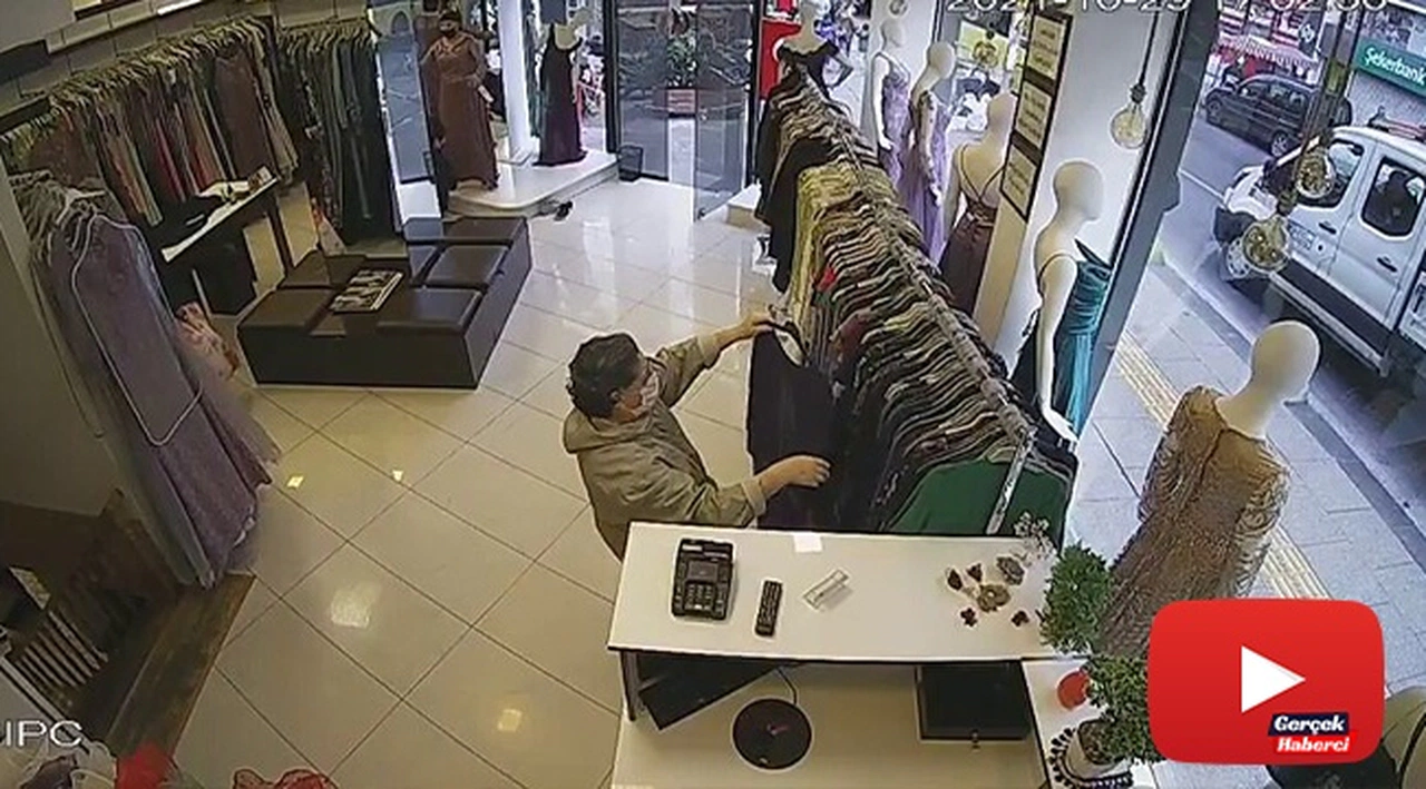 Abiye hırsızlığı kamerada... Abiyeyi önce beğendi sonra çaldı