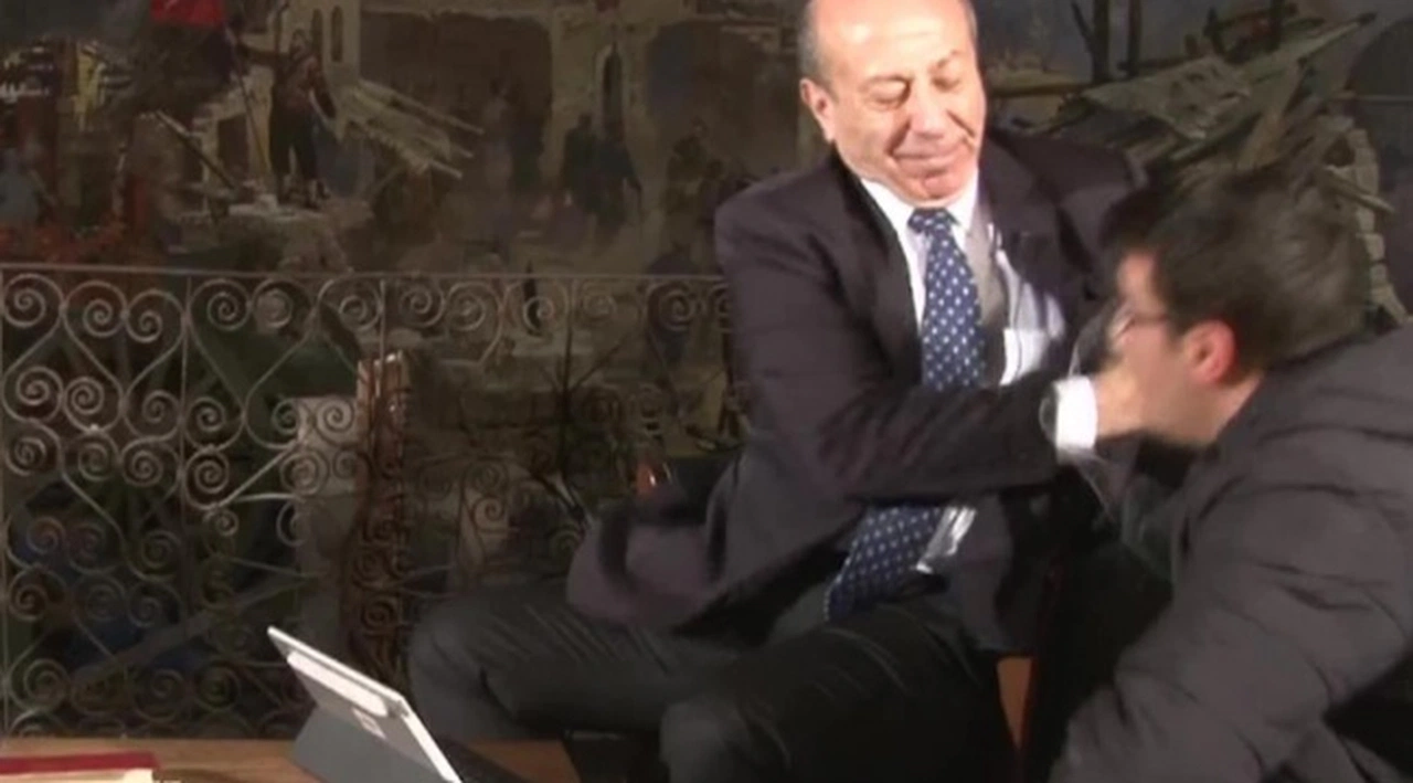 Canlı yayında tokat yiyen İHA muhabiri Ahmet Demir, Muharrem Sarıkaya ile uzlaşma yoluna gitti