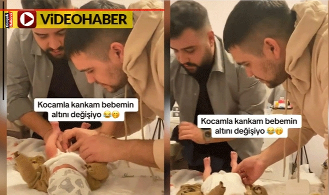 "Bebek bezi değiştirmek ne kadar zor" dedirten görüntüler... Baba ve kankası böyle uğraştı