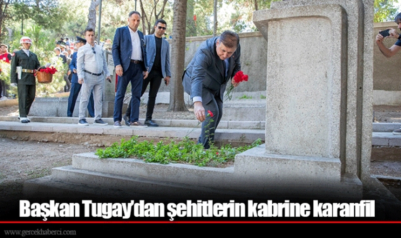 Başkan Tugay’dan şehitlerin kabrine karanfil
