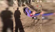 Buca'da sokakta uyuyan yaşlı adama tekme atan zanlılar yakalandı