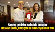 Kardeş şehirler kadrajda buluştu: Başkan Ünsal, Karşıyakalı birinciyi konuk etti