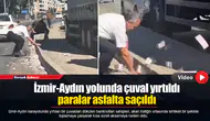 İzmir-Aydın yolunda çuval yırtıldı paralar asfalta saçıldı