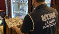 İzmir Konak'ta iş yerine operasyon: 672 sikke ele geçirildi