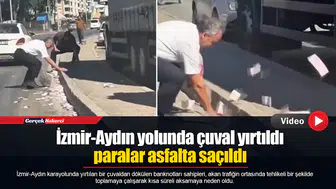 İzmir-Aydın yolunda çuval yırtıldı paralar asfalta saçıldı