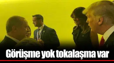 Görüşme yok tokalaşma var