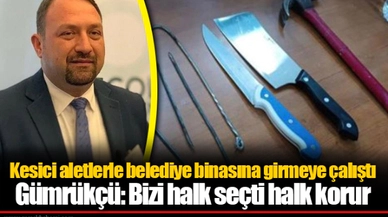 Kesici aletlerle belediye binasına girmeye çalıştı