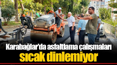 Karabağlar'da asfaltlama çalışmaları sıcak dinlemiyor