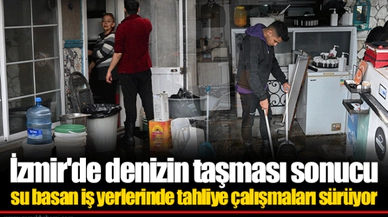 İzmir'de denizin taşması sonucu su basan iş yerlerinde tahliye çalışmaları sürüyor