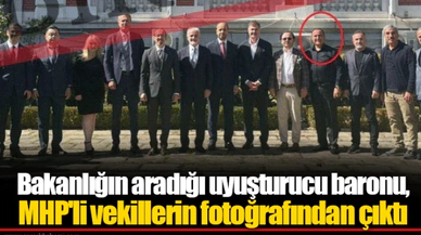 Bakanlığın aradığı uyuşturucu baronu, MHP'li vekillerin fotoğrafından çıktı