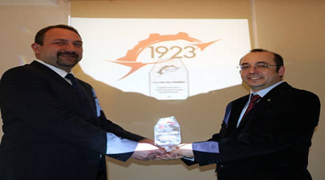GÜMRÜKÇÜ'YE  20. YIL ÖDÜLÜ