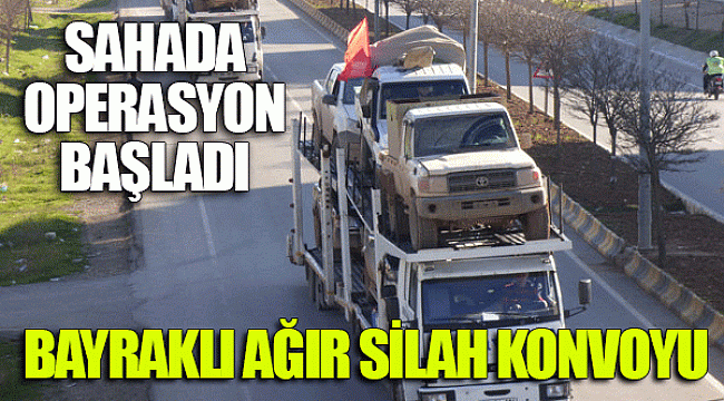 Bayraklı ağır silah konvoyu