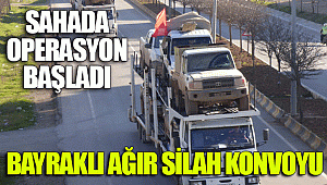 Bayraklı ağır silah konvoyu