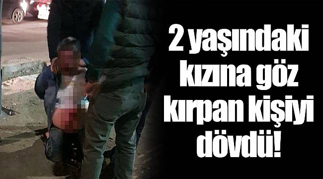 2 yaşındaki kızına göz kırpan kişiyi dövdü!