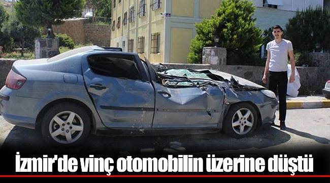 İzmir'de vinç otomobilin üzerine düştü