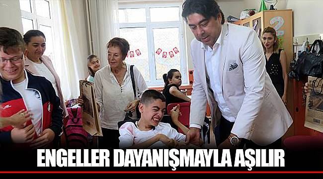 ENGELLER DAYANIŞMAYLA AŞILIR