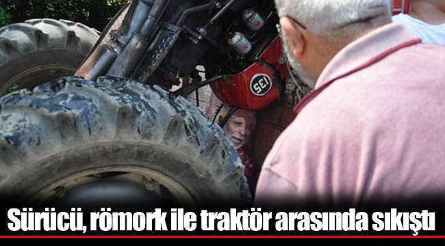Sürücü, römork ile traktör arasında sıkıştı