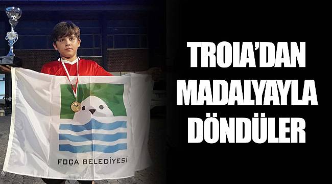 TROIA’DAN MADALYAYLA DÖNDÜLER