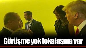 Görüşme yok tokalaşma var