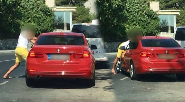 Tartıştığı eşi otomobilin kapılarını kilitleyince az daha canından oluyordu