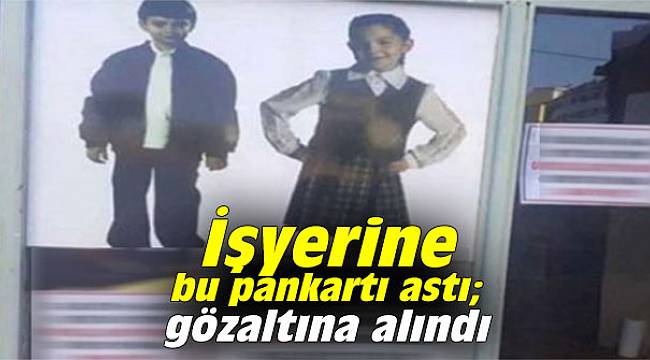 İşyerine bu pankartı astı; gözaltına alındı