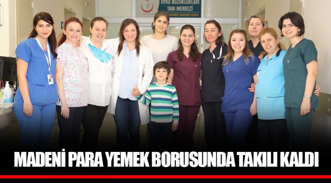 MADENİ PARA YEMEK BORUSUNDA TAKILI KALDI