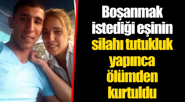 Boşanmak istediği eşinin silahı tutukluk yapınca ölümden kurtuldu