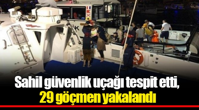 Sahil güvenlik uçağı tespit etti, 29 göçmen yakalandı