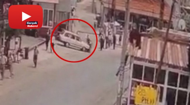 Otomobil ile motosikletin çarpıştığı kaza güvenlik kamerasında