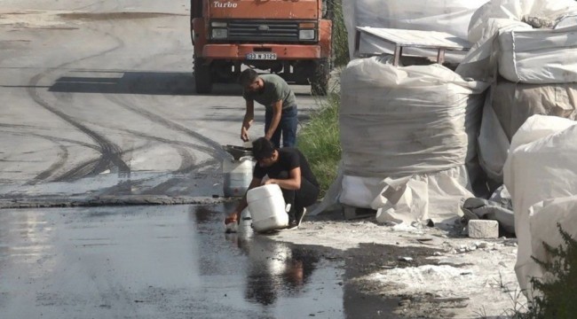 Tanker devrildi, akan mazotu vatandaşlar götürdü