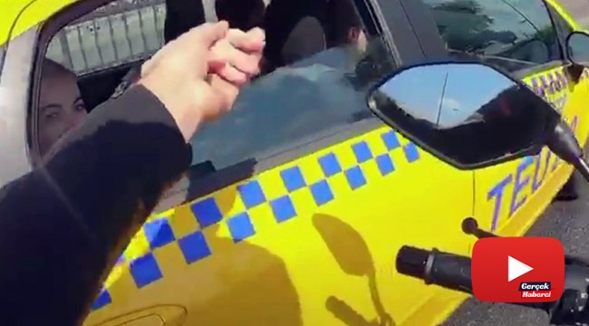 Önce camdan sarkan kadının elini tuttu, sonra makas atarak canını tehlikeye attı
