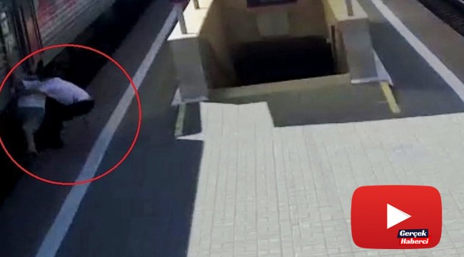 Yaşlı adamı trenin altında kalmaktan son anda polis kurtardı
