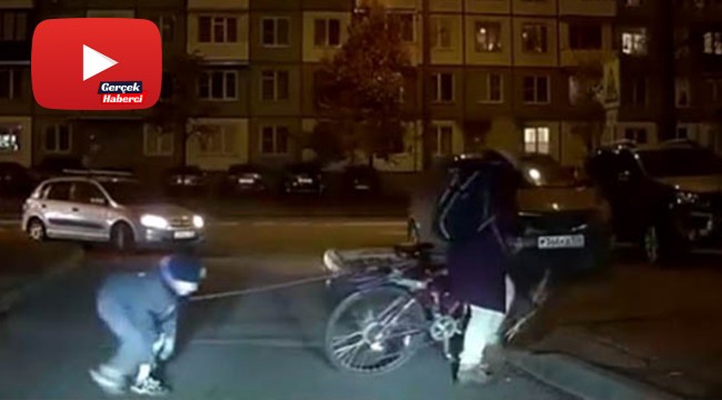 Çocuğunu bisikletine bağlayan anne tepki çekti