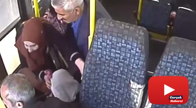Minibüsçünün koltuktan düşen yolcuyu hastaneye götürme çabası kamerada