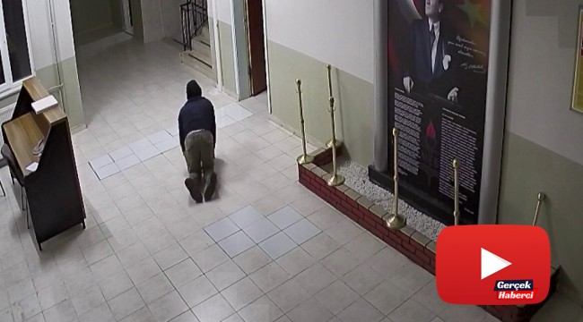 Okula giren hırsız, dışarıdan görünmemek için emekleyerek üst kata çıktı