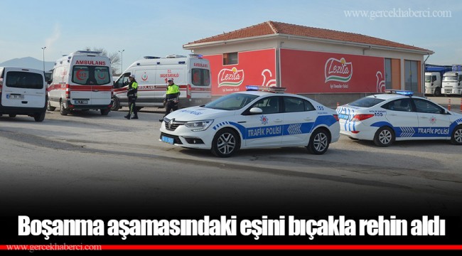 Boşanma aşamasındaki eşini bıçakla rehin aldı