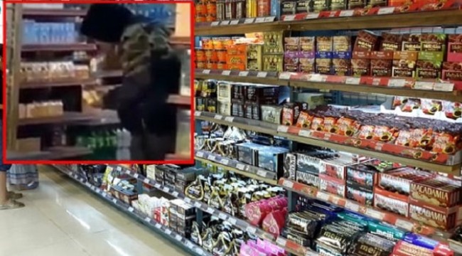 Koronavirüsü bulaştırmak için market raflarındaki ürünleri tek tek yaladı