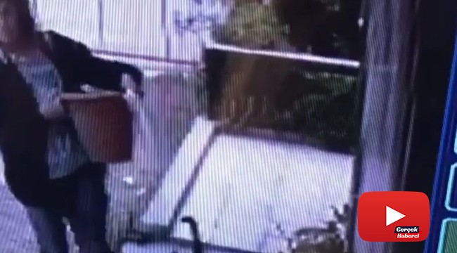 Bu da oldu: İzmir'de bir kadın saksı çalarken kameraya yakalandı