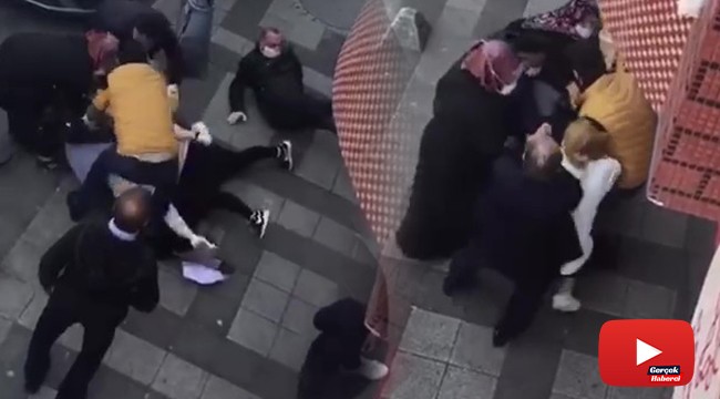 Ekmek sırasında bekleyen kadınların saç saça baş başa kavgası kamerada