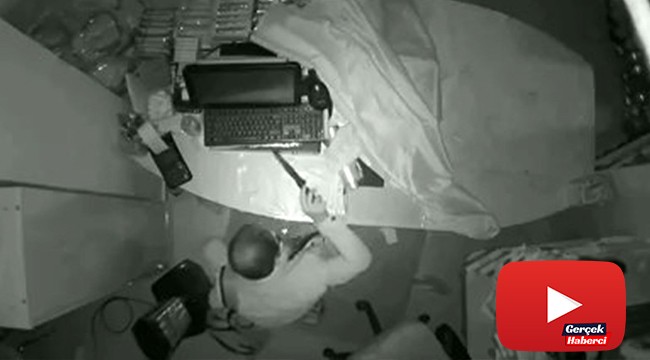Vatandaşın, marketteki hırsızlığı köpeği ile engellediği anlar kamerada