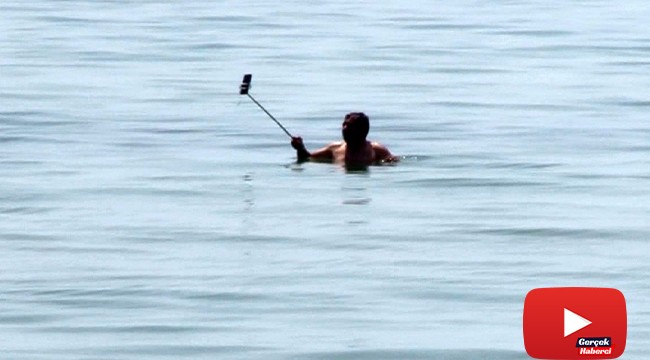 Yasağı dinlemedi denize girip Kamboçyada’ki arkadaşına yayın yaptı