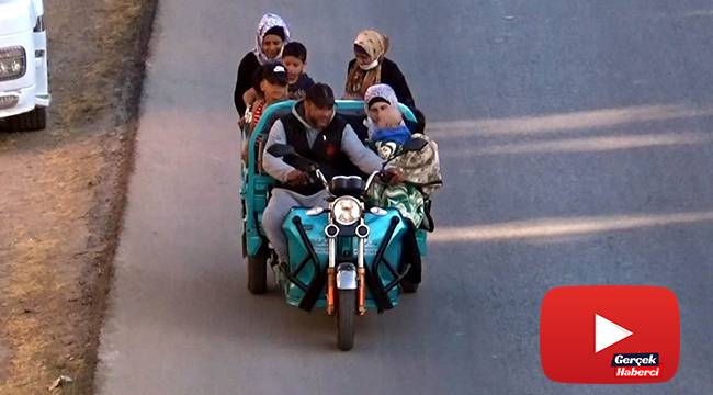 10 kişilik ailesini bir motosiklete bindirdi