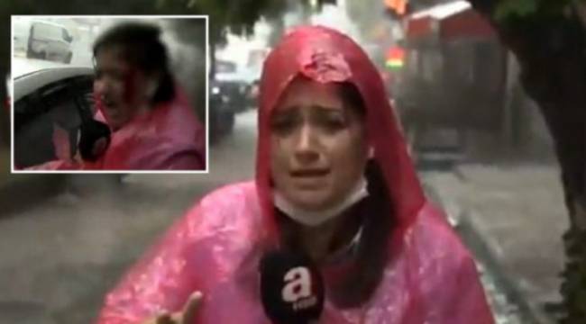 A haber muhabiri şiddetli yağış ve fırtınayı aktarırken canlı yayında başından yaralandı