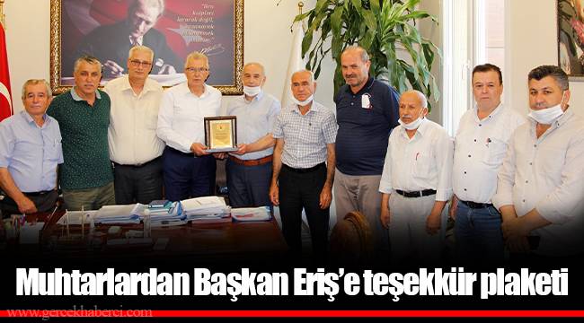 Muhtarlardan Başkan Eriş’e teşekkür plaketi
