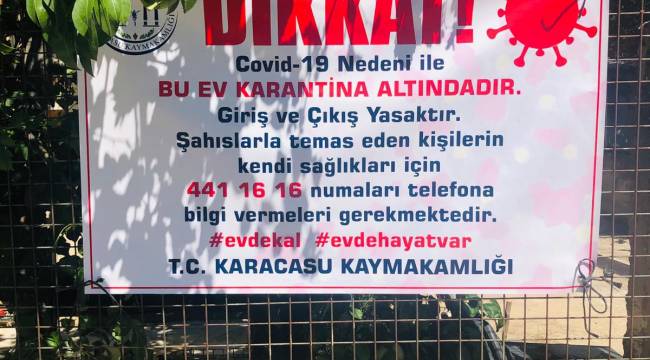Karantina altına alınan evlere afiş asıldı