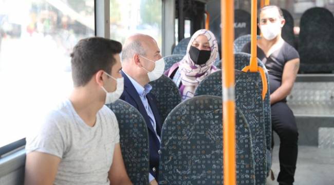 Soylu, halk otobüsüne binerek vatandaşları Kovid-19'a karşı uyardı
