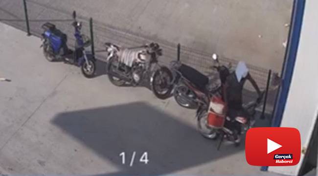 Kafasına geçirdiği kartonla motosiklet çalan şüpheli kamerada