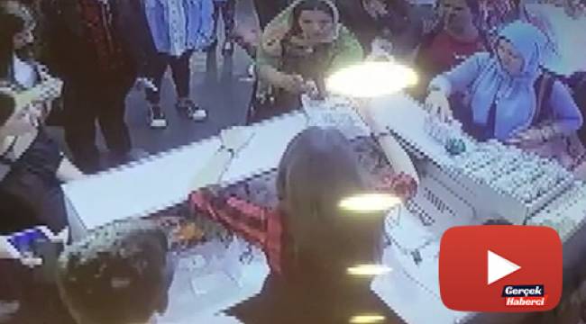 Kasiyerin dikkati, sahte para vermek isteyen kadını yakalattı
